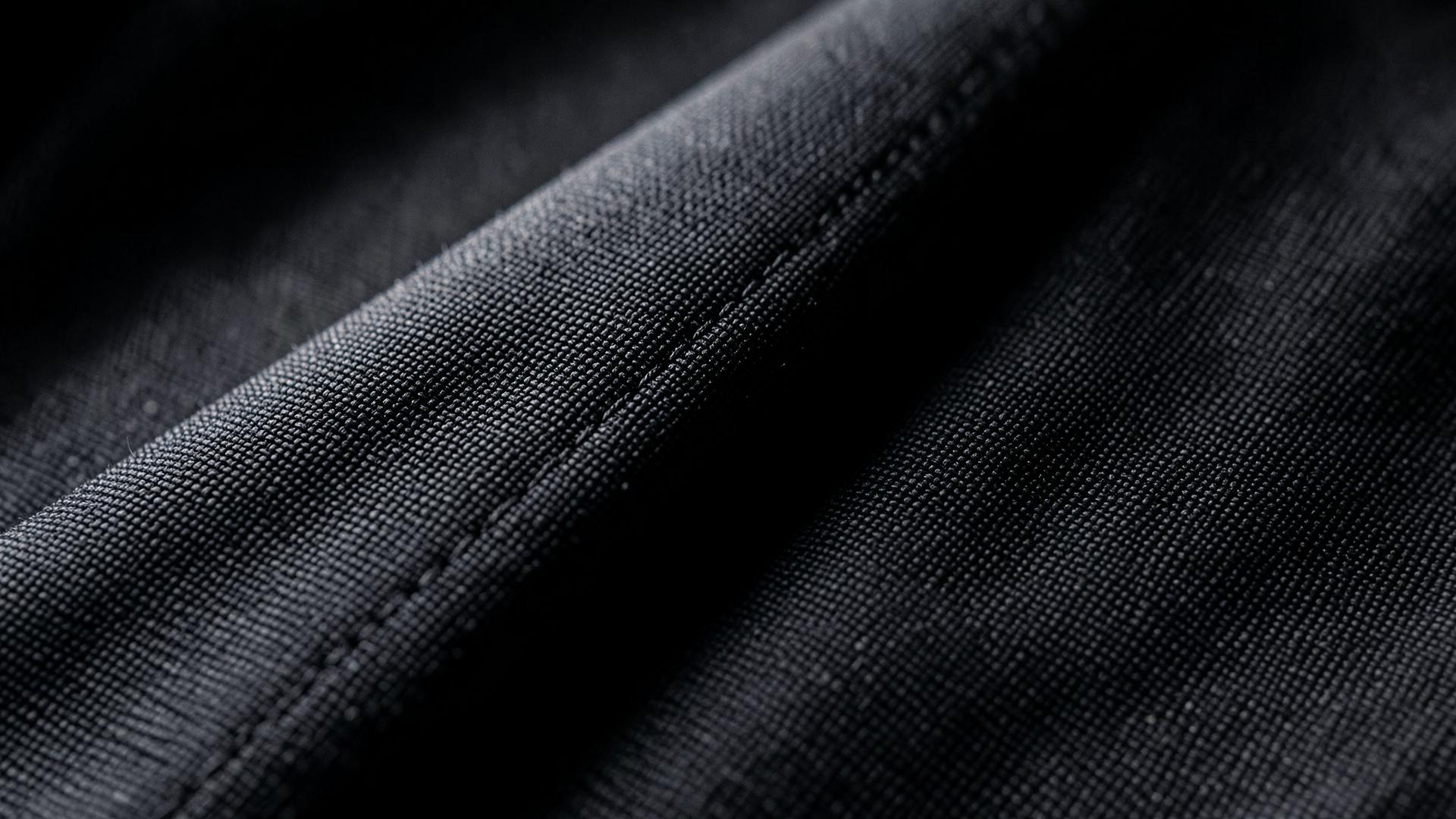 Macro detail of dark technical woven fabric